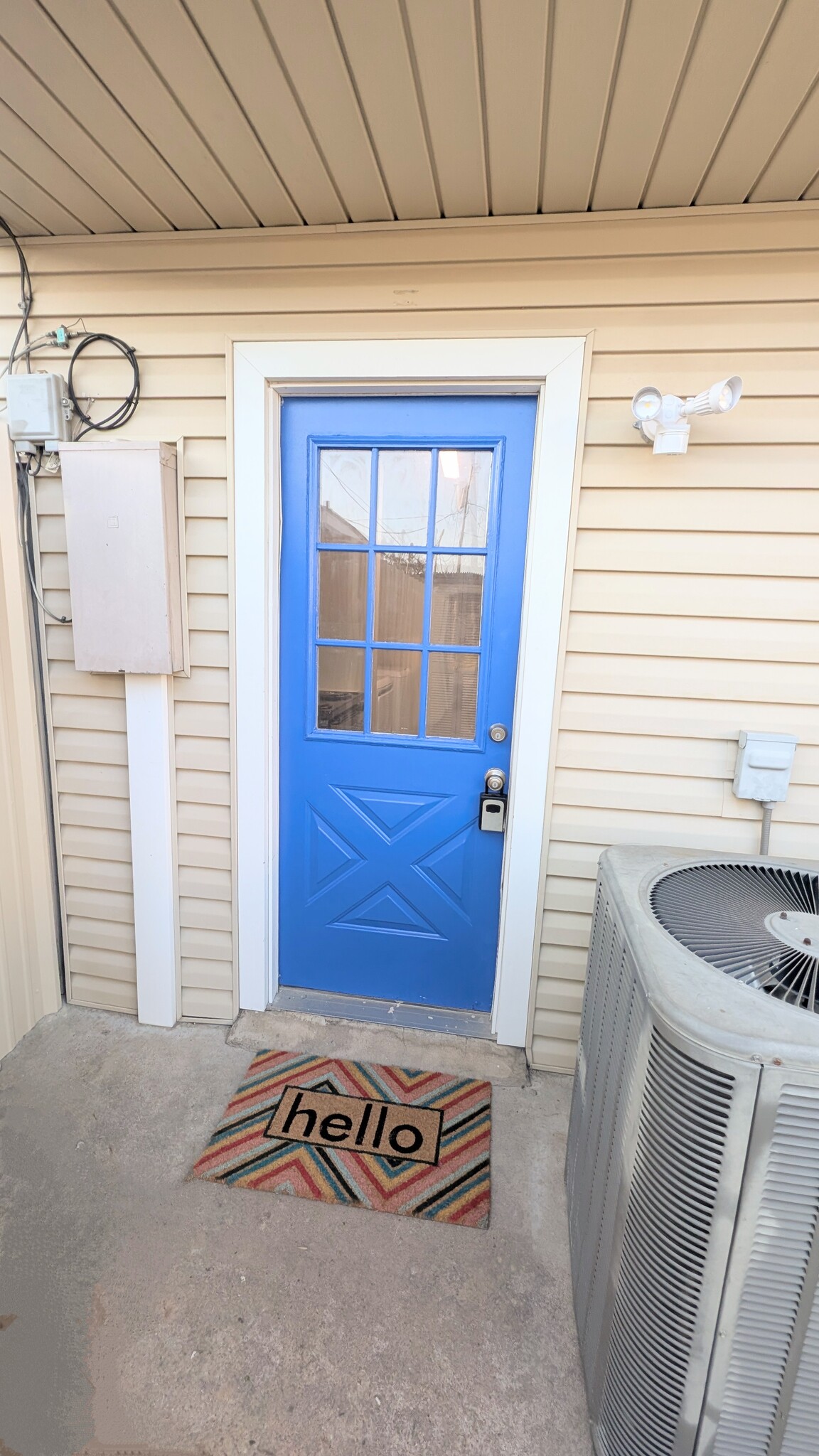 Welcoming back porch entrance leads to the kitchen. - 813 Clubside Dr