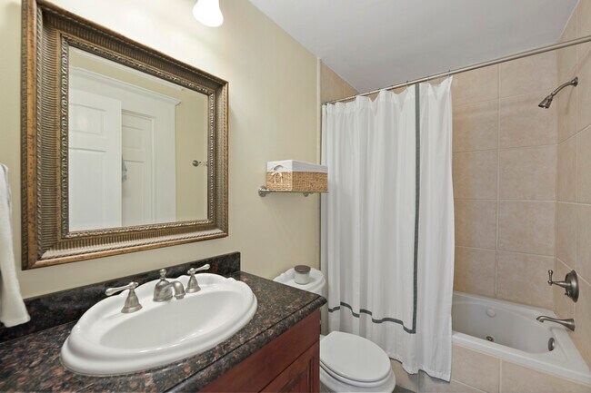 Each bedroom has a private attached bathroom - 259 14th St NE