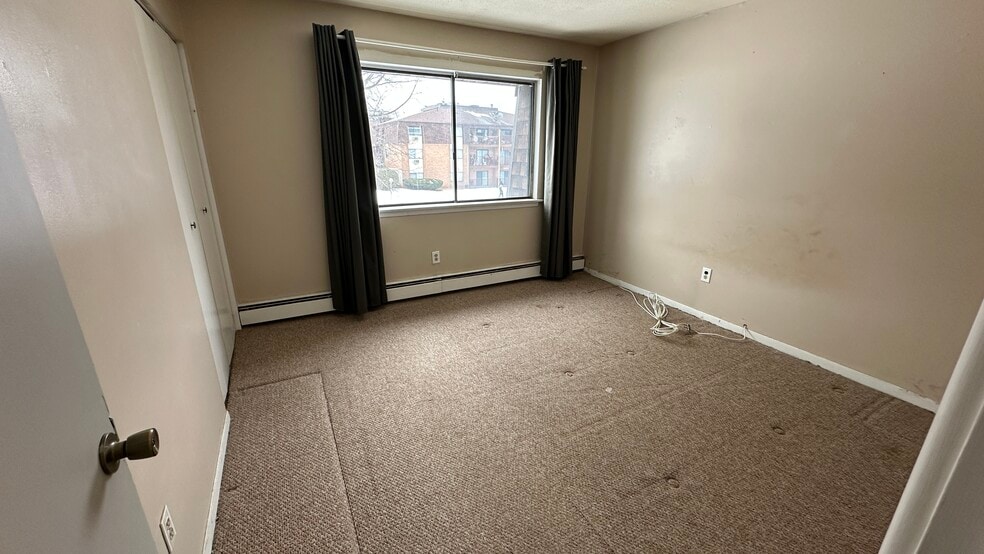 Bedroom 2 with large windows - 581 Crown St
