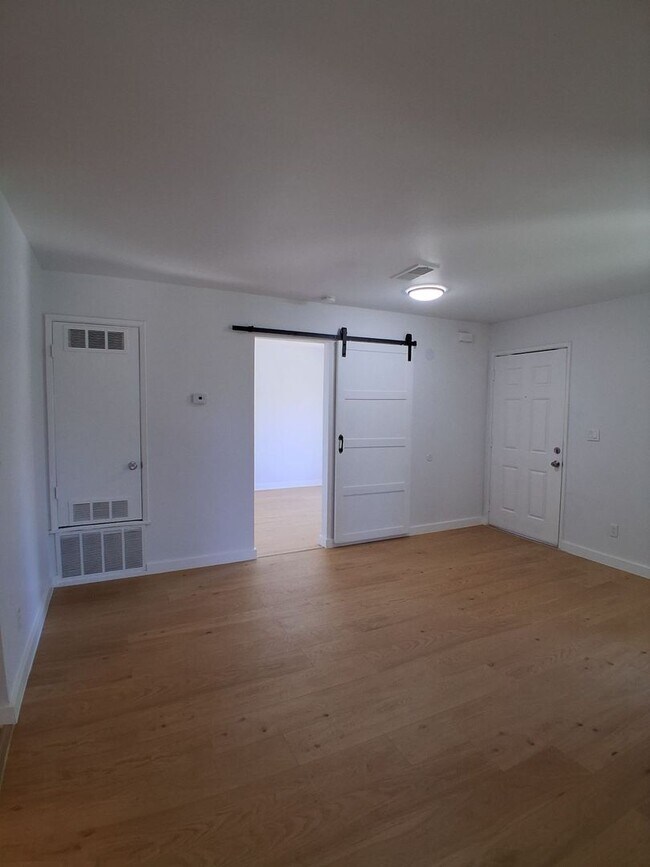 Building Photo - MOVE-IN SPECIAL: HALF OFF THE 1ST MONTH'S RENT – Beautifully Updated 2 Bedroom, 1 Bathroom Condo!