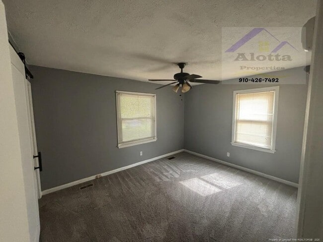 Building Photo - 6075 Lexington Dr