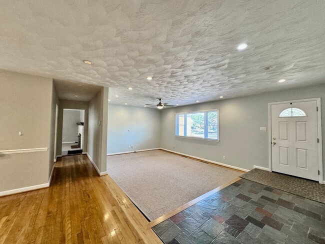 Building Photo - Available NOW! Lakefront 4 Bedroom/2 Bath Home, Pet-Friendly, Fenced Yard, Great School Zones!