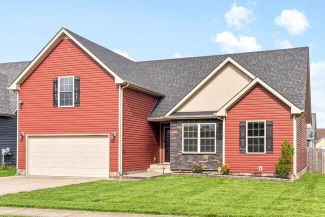 Building Photo - Pet Friendly Three Bedroom with Bonus!