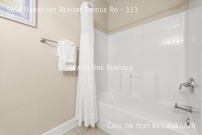 Building Photo - 5650 Barefoot Resort Bridge Rd