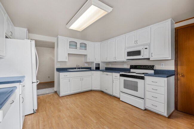Building Photo - 4 Bedroom Remodeled with 2 Stall Detached Garage