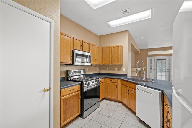 Building Photo - Charming Centennial Hills Home with Hardwood Floors & Covered Patio