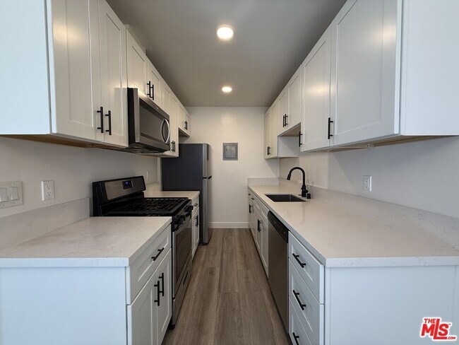 Building Photo - 3707 S Canfield Ave