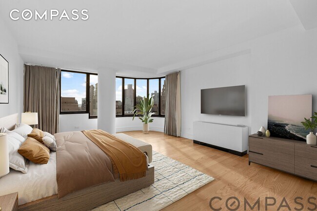 Building Photo - A Sky-High Duplex - Sunlit Sanctuary Above Madison Avenue
