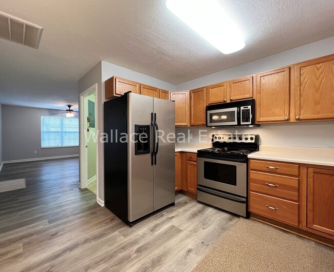Building Photo - FOUNTAIN CITY:  2 BEDROOM, 2 BATHROOM CONDO IN MAPLE CHASE