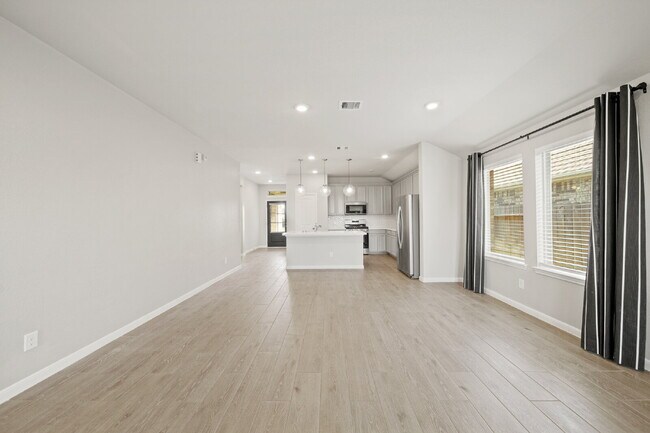 Building Photo - "Charming 4-Bed Sanctuary on Gentle Breeze Lane - Spacious 1861 Sq. Ft. Home with 2 Full Baths in...