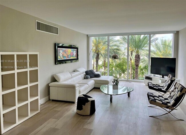 Building Photo - 10275 Collins Ave