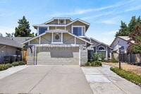 Building Photo - Spacious 4-Bedroom Retreat with 2.5 Baths