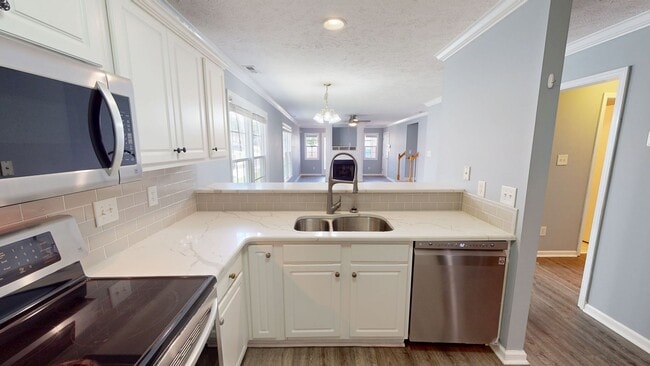 Building Photo - 3 Bedroom Ranch with Bonus Room in Gated Community & Jack Britt School District!