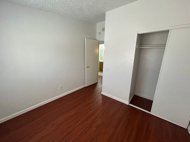 Building Photo - Single story home with large backyard and huge carport with plenty of storage.