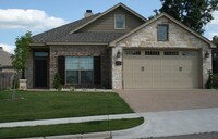 Building Photo - Available Now: 4 bedroom house