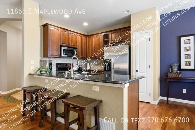 Building Photo - 11865 E Maplewood Ave