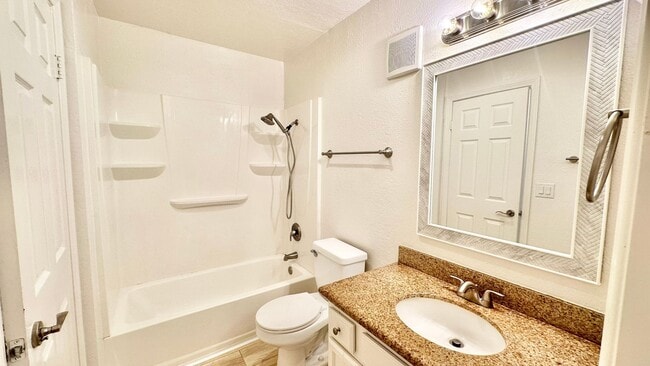 Building Photo - Light, Bright, and Lovely Ground Level Con...