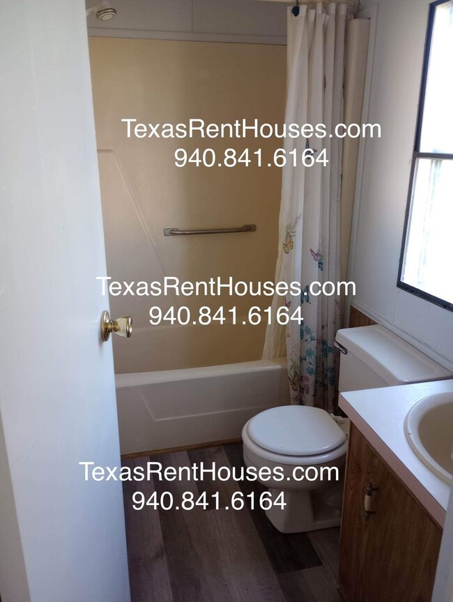 Building Photo - Cute home ready for you