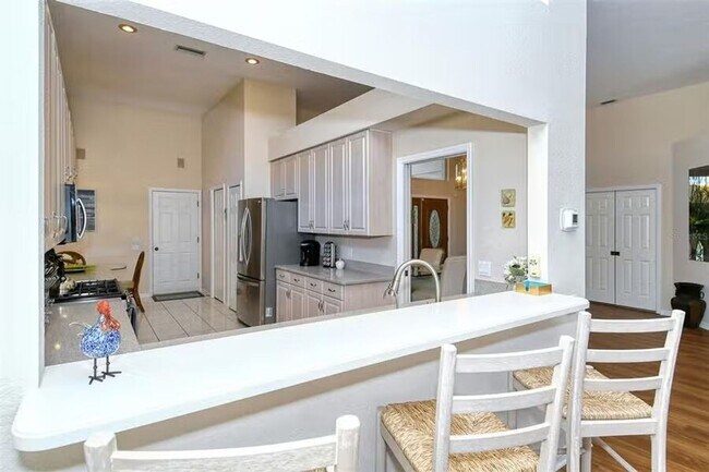 Building Photo - AVAILABLE JULY 1ST! Water & Golf Views in University Park Country Club with Pool and Spa!  3bed |...