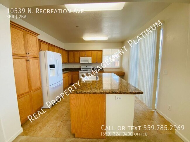 Building Photo - 10539 N Recreation Ave