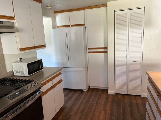 Building Photo - Four bedroom two bathroom home with a pool in Central Davis