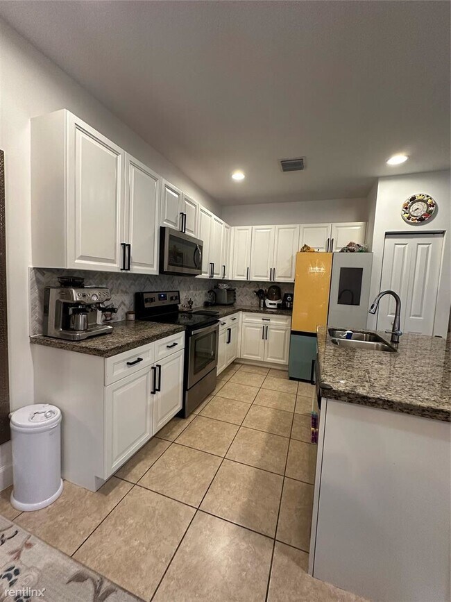 Building Photo - 4 br, 3 bath House - 4879 NW 55th Pl