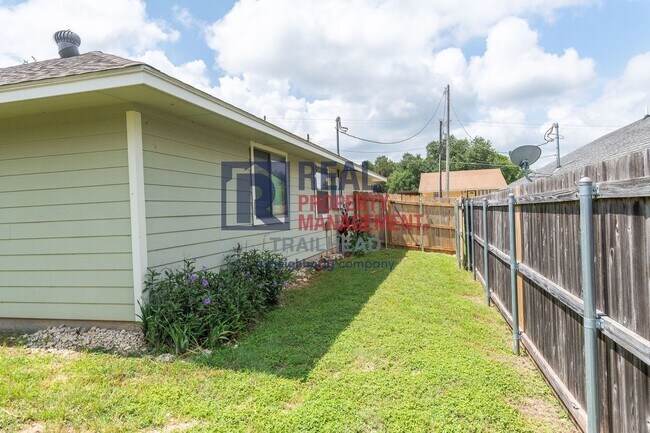 Building Photo - Well-Maintained Home with Large Yard and Storage Shed