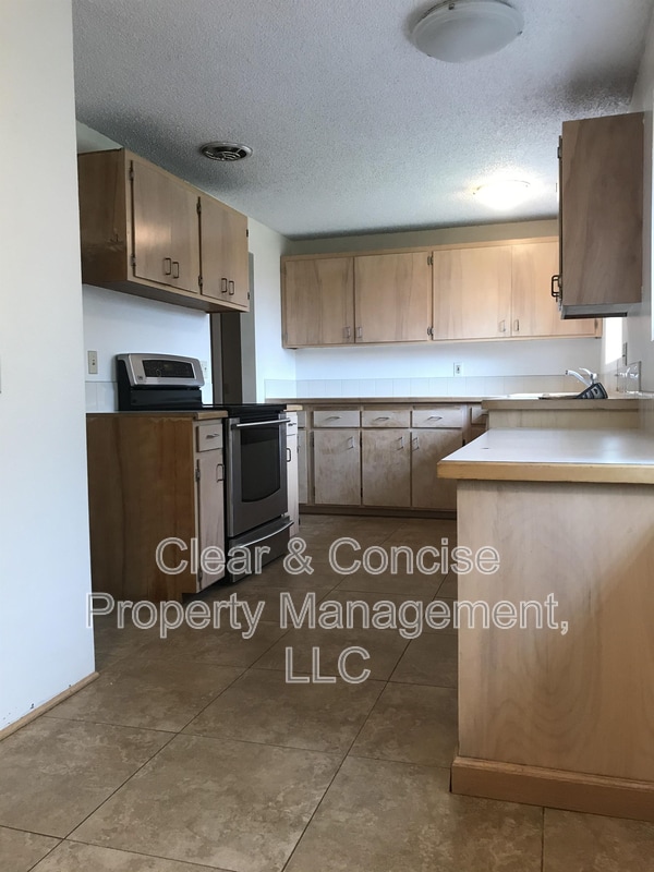 Building Photo - 101 E 48th Ave