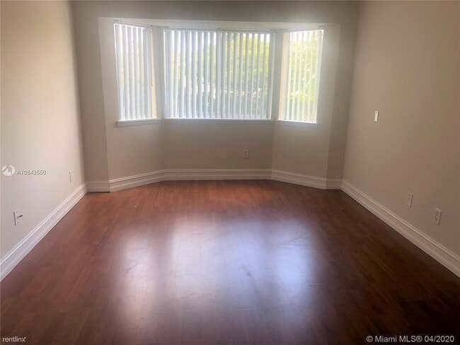 Building Photo - 2 br, 1 bath Condo - 8333 Pines Blvd