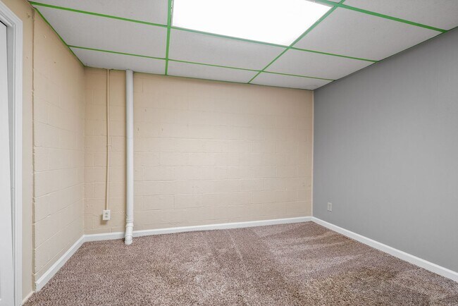 Building Photo - Lovely home on beautiful, wooded corner - Just Reduced