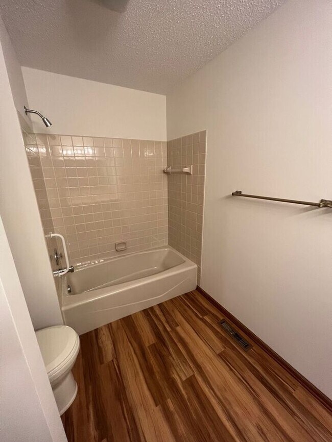 Building Photo - End Unit Single Level Townhouse, New Floor...