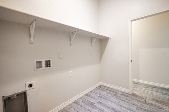 Building Photo - 14852 Mike a Mendoza Ave