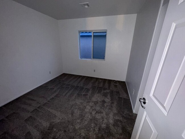 Building Photo - Fresh Paint/New Flooring all inside! Four ...