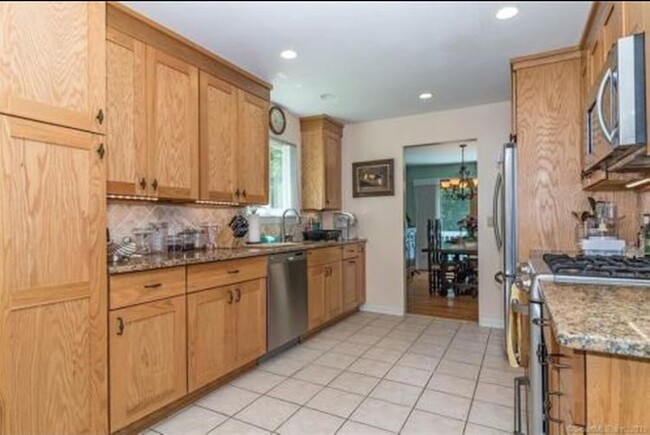 Kitchen with Dining room background - 35 Homestead Rd