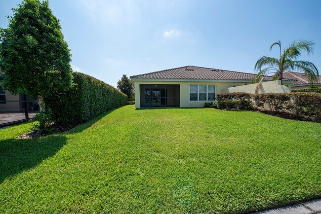 Building Photo - Deluxe Villa Lake view all Tile. 3 Bedrooms+2 Baths