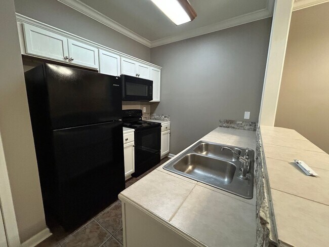 Building Photo - CONDO UNIT IN DENHAM SPRINGS