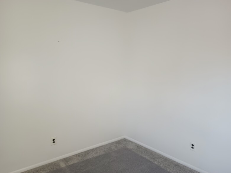 Spare bedroom far wall and corner. - 1331 N Black Horse Pike