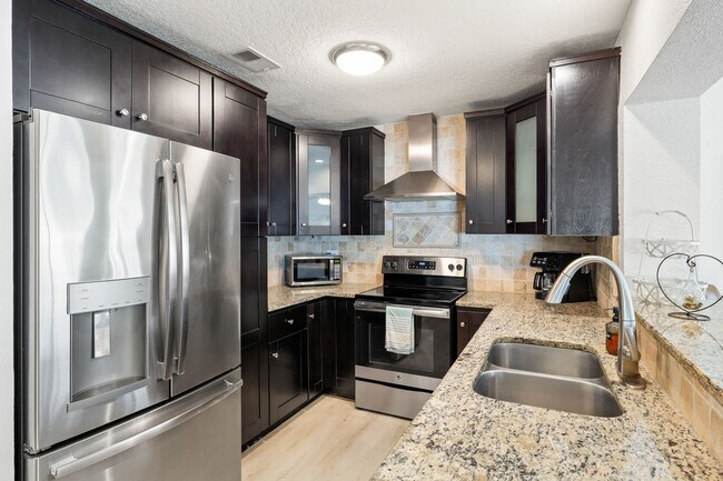 Building Photo - 6398 Woodland Blvd