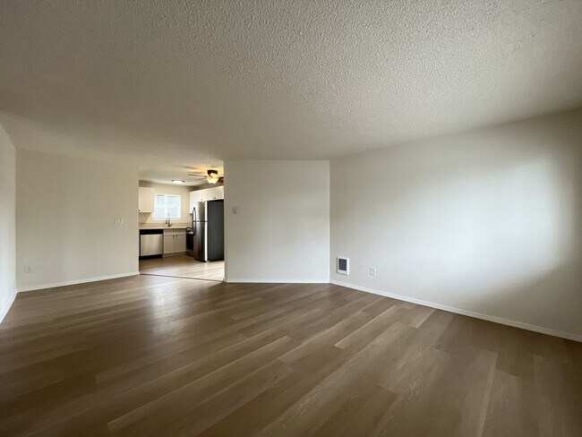 Building Photo - Inviting 2 Bedroom Home with Open Layout, Stainless Steel Appliances & Private Outdoor Retreat