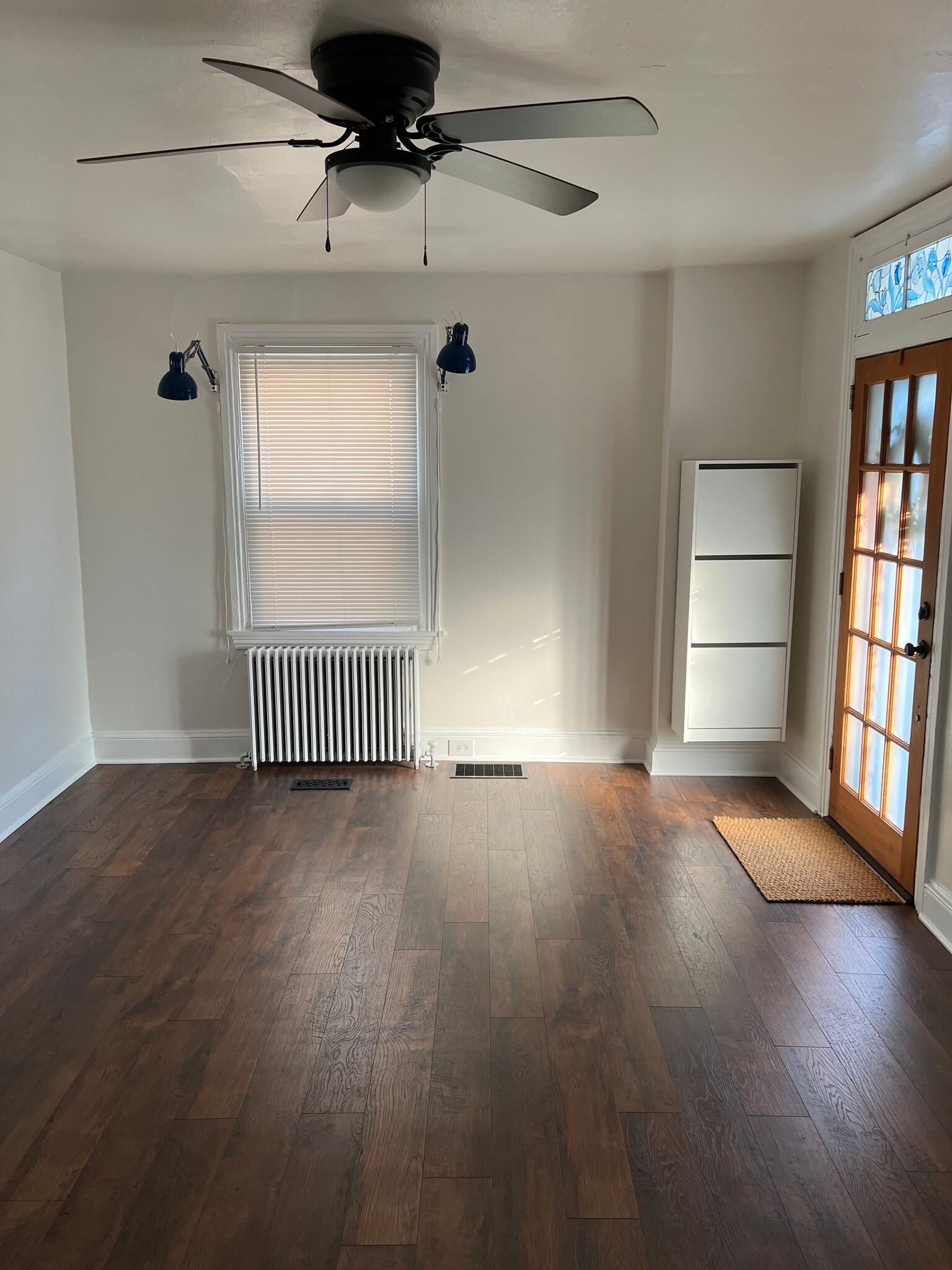 The front room serves as a spacious living room, with room for a dining nook. - 126 Merion Ave
