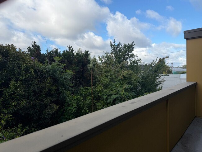 Building Photo - Bright Live-Work Studio with Deck & Tall Ceilings off Lowell Street in Oakland