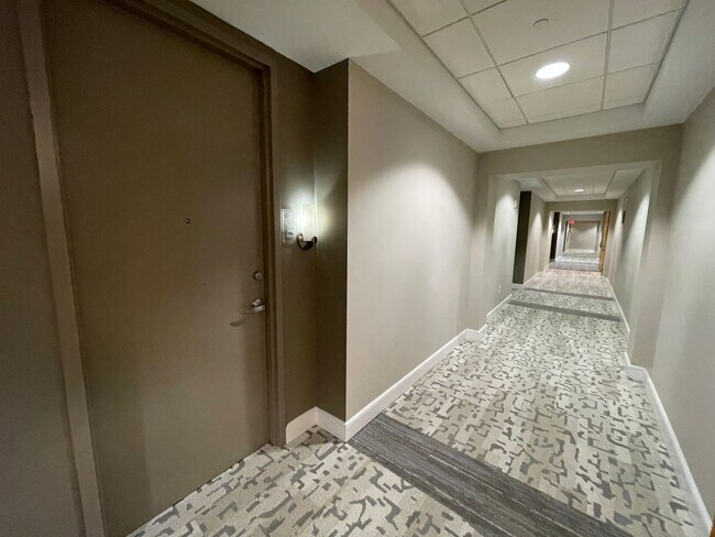 Building Photo - Modern High-Rise Condo in Downtown Orlando...