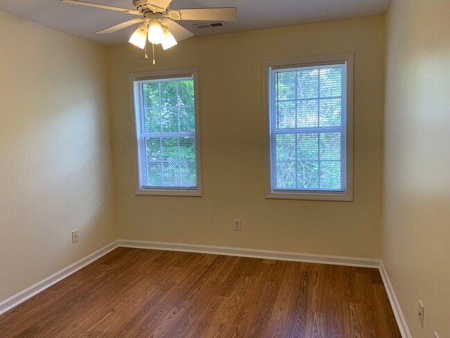 Building Photo - SPACIOUS HOME WITH DOWNSTAIRS PRIMARY BEDROOM AND BATH- LAKE WHEELER/ FARMER'S MARKET AREA