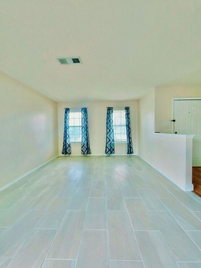 Building Photo - Coming Soon Spacious 4-Bedroom Home for Re...