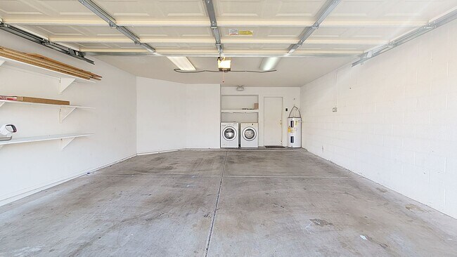 Building Photo - Townhome with two car garage! Community pool!