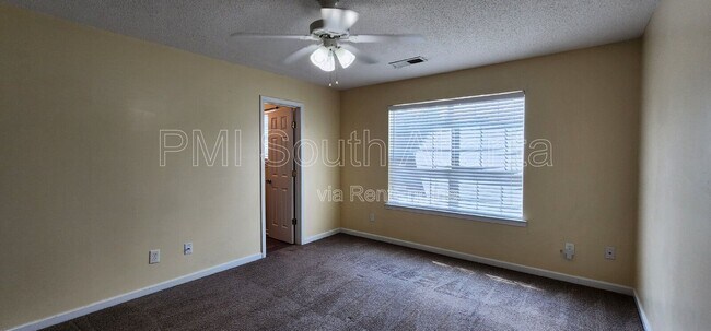 Building Photo - 7298 Wagon Wheel Ct