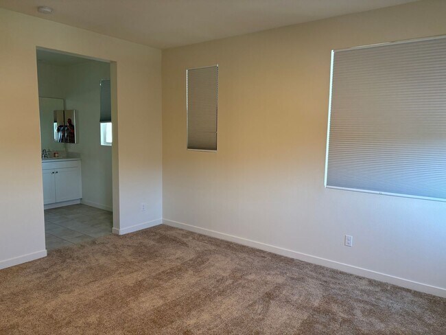 Building Photo - Spacious 3-Bedroom Townhome with Garage and Solar