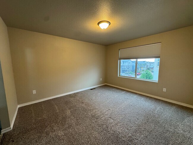 Building Photo - Modern 3-Story Corner Lot Home with Hot Tu...