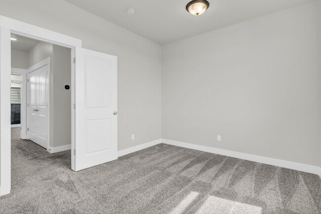 Building Photo - New 2024 Townhome with Office & 2 Car Garage