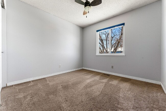 Building Photo - Charming 3-Bed, 2-Bath Aurora Home with Large Backyard & Entertainer's Deck